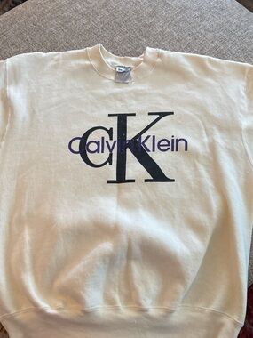 Source Unknown Cream Sweatshirt with Black and Purple Logo